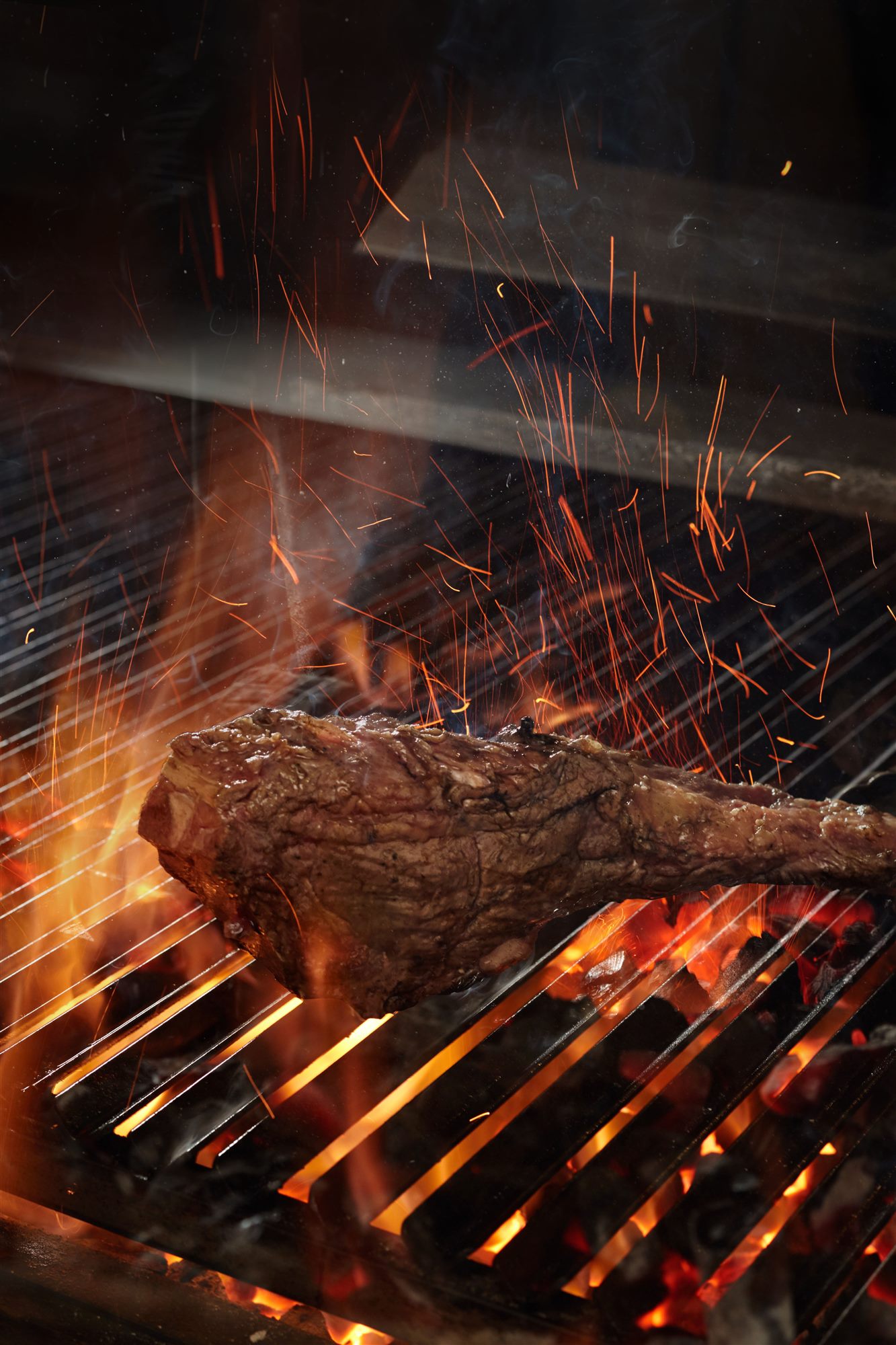A steak seared over open flame