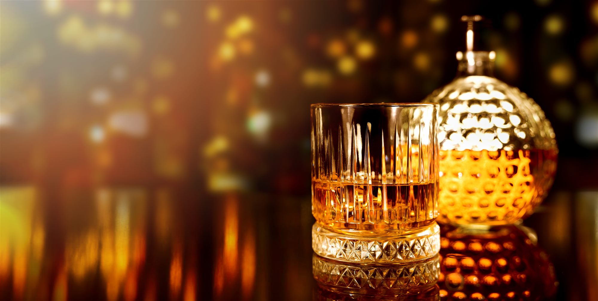 Whiskey poured into a cut-crystal glass